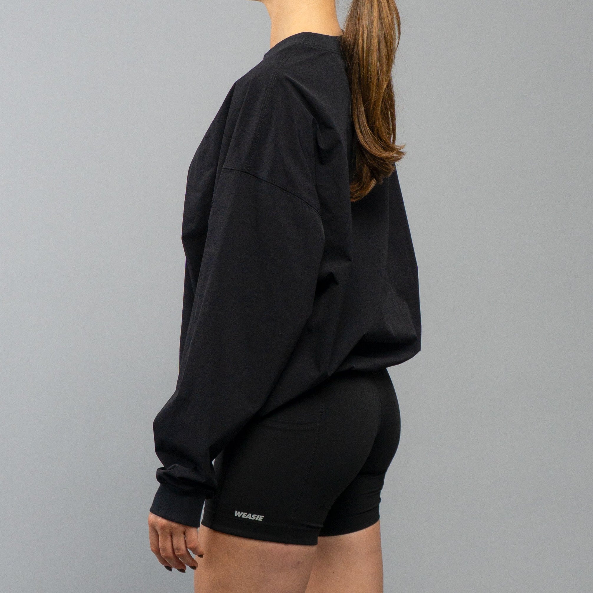 Side view, women's black running recovery technical sweatshirt – WEASIE